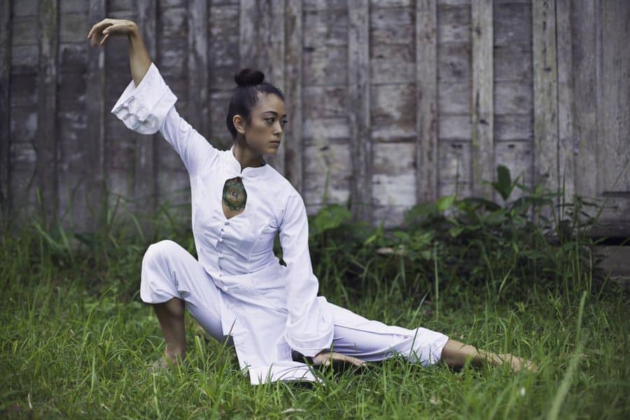 Woman doing a qigong stance